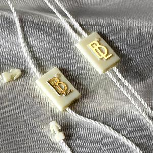 Kledingstuk zegel tags - ST-M163