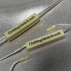 Kledingstuk zegel tags - ST-M209